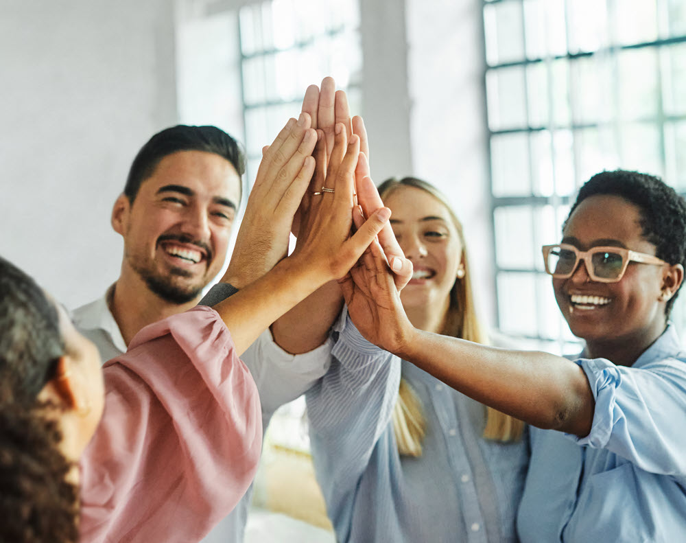 Group of people high fiving