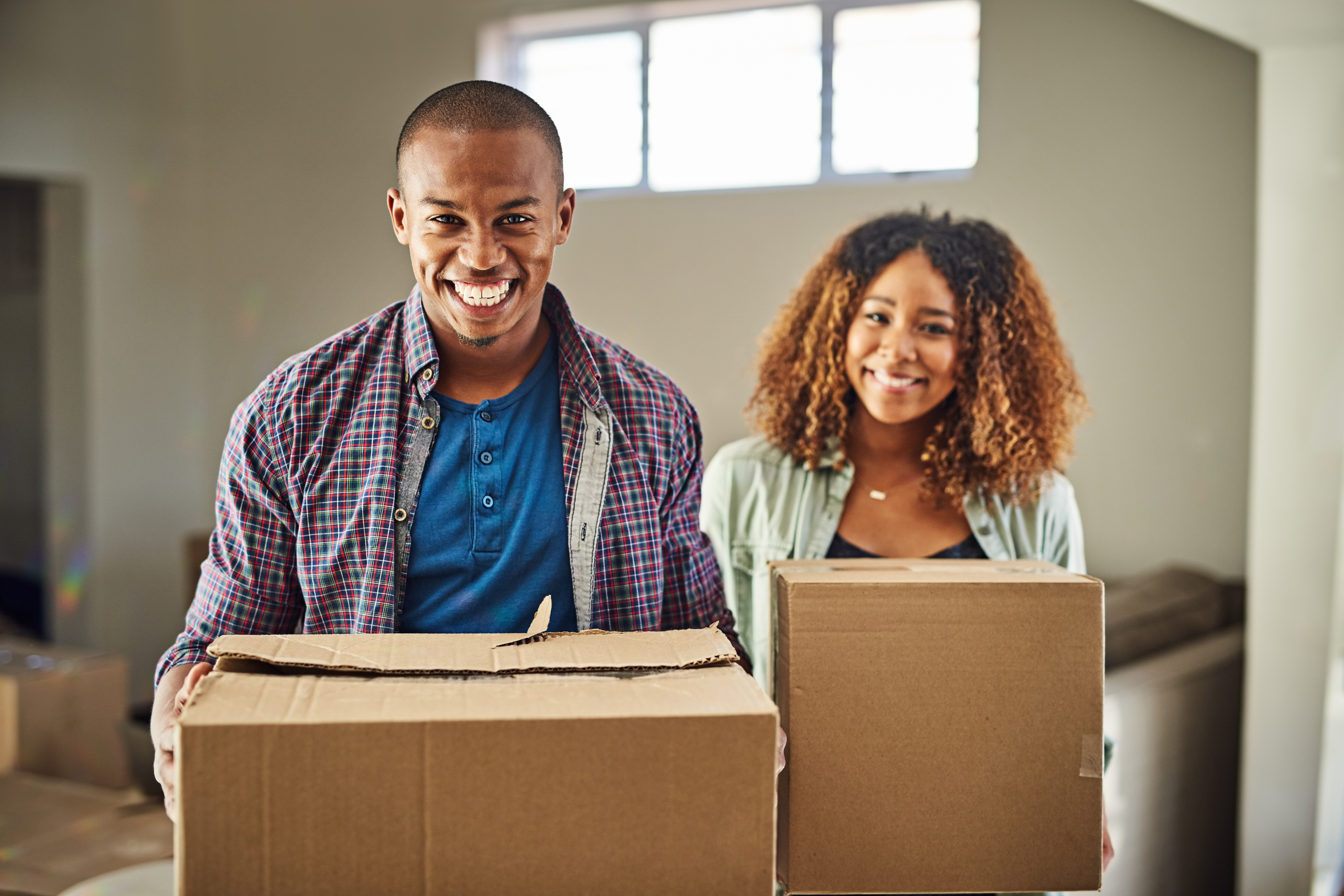 A couple moving into a new home.